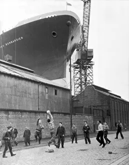 The British Bombardier Cargo ship towering over the surrounding warehouses at Clyde The British Bombardier Cargo ship towering over the surrounding warehouses at Clyde