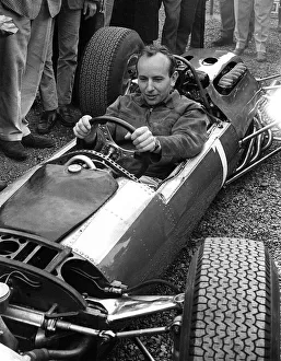 00150 Gallery: British Grand Prix 1965 Silverstone July 1965 John Surtees sits in his Ferrari