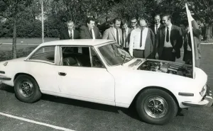 British Leyland service and technical specialists from many European countries examine a British Leyland service and technical specialists from many European countries examine a