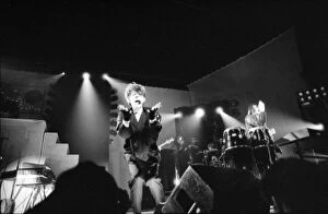 Images Dated 23rd February 1984: British pop group The Thompson Twins performing on stage during a concert in Oxford