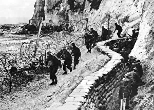 00154 Gallery: British troops patrol beaches as part of the British coastal defences during WW2 1941