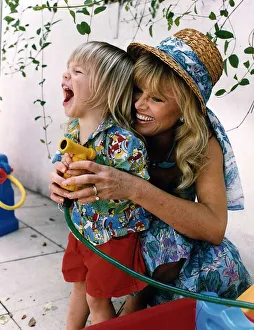 Images Dated 1st July 1990: Britt Ekland Film Actress with her son Thomas Jefferson A©Mirrorpix
