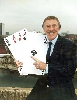 Images Dated 10th December 1993: BRUCE FORSYTH HOLDING GIANT PLAYING CARDS- PLAY YOUR CARDS RIGHT - 10 / 12 / 1993