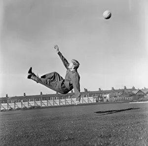 00244 Gallery: Burnleys Ray Pointer attempts an over head kick during training 14 / 02 / 1962