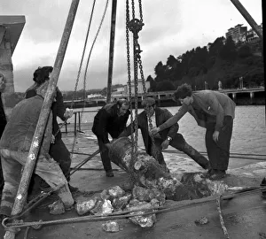 Cannon being recovered from South Quay on Torquay harbour in February 1973 Cannon being recovered from South Quay on Torquay harbour in February 1973