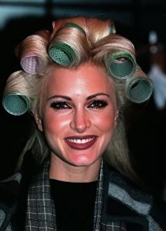 Images Dated 1st July 1997: Caprice having her hair and make up done at the Littlewoods Fashion Show With rollers in