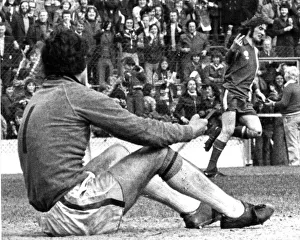 Cardiff City's Robin Friday gives a two finger salute to Luton goalkeeper Milija Cardiff City's Robin Friday gives a two finger salute to Luton goalkeeper Milija