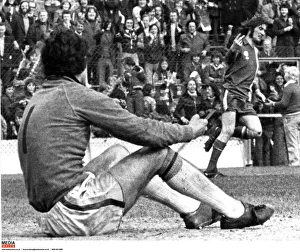 Cardiff City's Robin Friday gives a two finger salute to Luton goalkeeper Milija Cardiff City's Robin Friday gives a two finger salute to Luton goalkeeper Milija