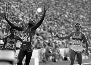 Images Dated 8th August 1984: Carl Lewis of the United States of America wins gold in the Mens 200 meters Final at
