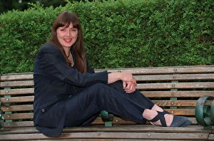 Images Dated 8th June 1997: Carol Vorderman TV Presenter June 1997 Sitting on park bench