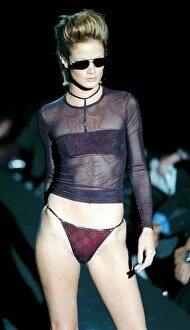 Images Dated 6th October 1997: Carolyn Murphy Gucci swimwear Milan Fashion Show 1997 Wearing a red string bikini