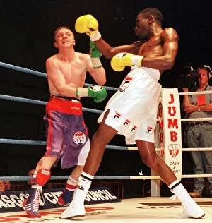 Images Dated 27th June 1999: Cassius Baloyi lands a right on Brian Carr June 1999
