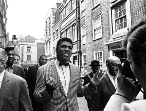 The Peoples Champion Gallery: Cassius Clay later to become Muhammad Ali (centre) In town for the heavyweight title