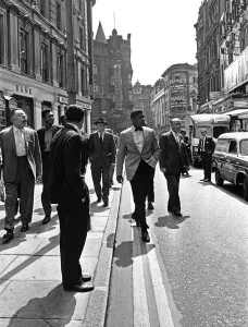 The Peoples Champion Gallery: Cassius Clay (Muhammad Ali) (centre) in London England ahead of his next fight