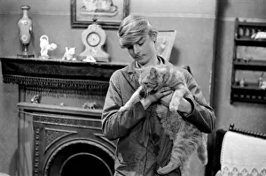 The cast of Coronation Street on set. Bobby the Corrie cat, with his handler The cast of Coronation Street on set. Bobby the Corrie cat, with his handler