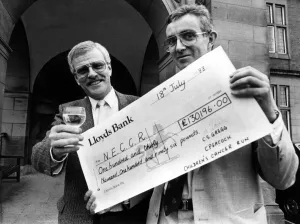 Charity fun runners were the toast of the hospital as they handed over a cheque for more Charity fun runners were the toast of the hospital as they handed over a cheque for more