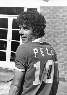 Charlie Aitken wearing a Pele football shirt. 25th May 1977 Charlie Aitken wearing a Pele football shirt. 25th May 1977