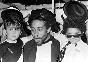 Images Dated 14th June 1980: Charlie Anderson, guitarist with The Selector, joined children on a Two-Tone float during