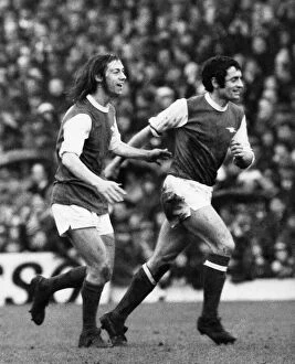 Charlie George and Captain Frank McLintock of Arsenal. April 1971 P006192
