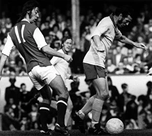 Images Dated 30th September 1972: Charlie George Football Player Arsenal 1972 loses out to terry paine during an
