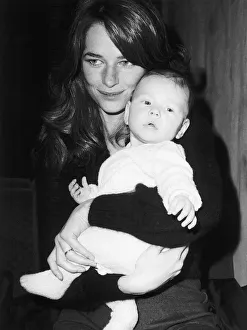 Charlotte Rampling - January 1973 At Heathrow Airport with her baby Barnaby Charlotte Rampling - January 1973 At Heathrow Airport with her baby Barnaby