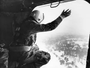 A cheery wave from Master ALM Bob Danes as the RAF helicopter from 202 Squadron at A cheery wave from Master ALM Bob Danes as the RAF helicopter from 202 Squadron at