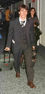 Chelsea and Italy footballer Gianfranco Zola arriving at Heathrow airport after England Chelsea and Italy footballer Gianfranco Zola arriving at Heathrow airport after England