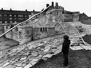 Images Dated 13th November 1974: A child looking at a £22000 playground in Speke, Liverpool dubbed by local children