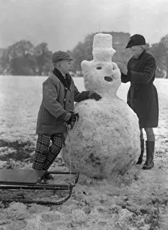 Children build a snowman in a Bristol park 31st December 1961 Children build a snowman in a Bristol park 31st December 1961