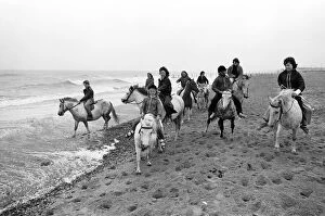 East Yorkshire Gallery: Children enjoying a seaside canter on the ponies despite the weather at Hornsea