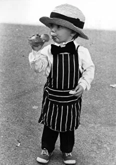 Children: Fancy Dress: Dressed up.... Two-year-old butcher boy Darrell Piper