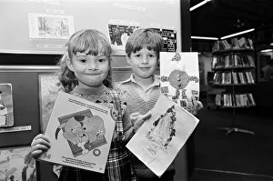 Children holing their entries for a Christmas card competition. Teesside, December 1985 Children holing their entries for a Christmas card competition. Teesside, December 1985