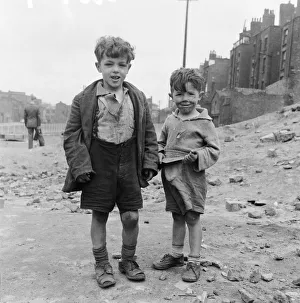 Children of Liverpool playing in a bomb site left since the end of the Second World war Children of Liverpool playing in a bomb site left since the end of the Second World war