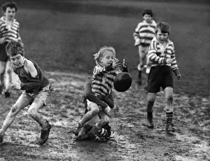Children playing rugby in the mud 5th April 1972. When it comes to Rugby Children playing rugby in the mud 5th April 1972. When it comes to Rugby