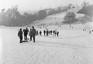 Children take the slopes of a Bristol park after a fresh fall of snow. 2nd January 1962 Children take the slopes of a Bristol park after a fresh fall of snow. 2nd January 1962