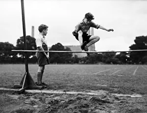 Children training for sport at Battersea athletic track Children training for sport at Battersea athletic track