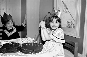 Images Dated 5th March 1981: Childrens birthday party: The birthday girl cuts the cake. March 1981 PM 81-01186b
