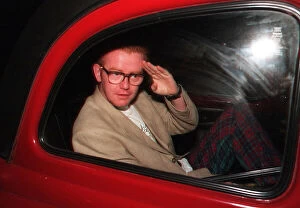 Images Dated 28th April 1995: Chris Evans Leaving His Hotel In The Back Of A Red Taxi To Present His Early Morning