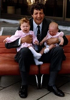 Chris Serle TV Presenter with two babies