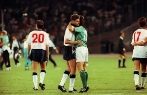 Chris Waddle Football is consoled and embraced by Lothar Matthaus of W Germany after Chris Waddle Football is consoled and embraced by Lothar Matthaus of W Germany after