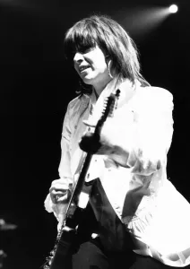 Chrissie Hynde singer with The Pretenders pop group 1987 playing guitar in concert Chrissie Hynde singer with The Pretenders pop group 1987 playing guitar in concert