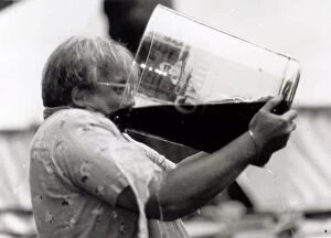 Images Dated 10th July 1989: Christopher Biggins drinking from the largest glass of whisky in the world