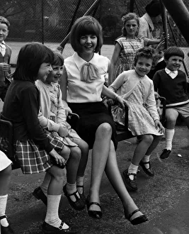 Cilla Black pop singer entertainer in children's playground Coram Fields London Cilla Black pop singer entertainer in children's playground Coram Fields London