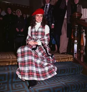 Images Dated 15th February 1977: Cindy Breakspeare Miss World 1977 wearing tartan outfit dress sitting on stairs
