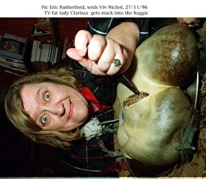 Images Dated 27th November 1996: Clarissa from Two Fat Ladies TV Programme gets stuck into Haggis A©mirrorpix