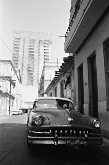 Bumper Collection: A classic American De Soto car seen here in the back streets of Havana