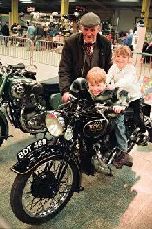 Images Dated 26th March 1995: Classic Bike Show - Ron Butler from Brotton puts his great grandchildren Stacey