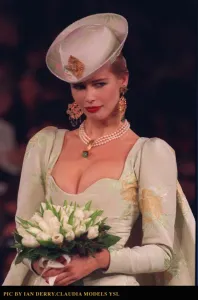 Claudia Schiffer models a wedding dress by Yves Saint Laurent at the Paris Fashion Show Claudia Schiffer models a wedding dress by Yves Saint Laurent at the Paris Fashion Show