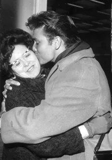 CLIFF RICHARD IS GREETED BY HIS MOTHER, MRS. WEBB AT HEATHROW ON HIS RETURN FROM A CLIFF RICHARD IS GREETED BY HIS MOTHER, MRS. WEBB AT HEATHROW ON HIS RETURN FROM A