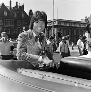 Images Dated 13th June 1973: Cliff Richard leaving a Birmingham hotel for location work on his latest film